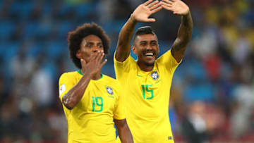 MOSCOW, RUSSIA - JUNE 27: Willian of Brazil and Paulinho of Brazil celebrate at the end of the 2018 FIFA World Cup Russia group E match between Serbia and Brazil at Spartak Stadium on June 27, 2018 in Moscow, Russia. (Photo by Robbie Jay Barratt - AMA/Getty Images)