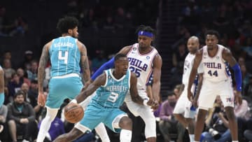 Nov 23, 2022; Charlotte, North Carolina, USA; Charlotte Hornets guard Terry Rozier (3) drives past Philadelphia 76ers guard forward Daniel House Jr. during the first half at the Spectrum Center. Mandatory Credit: Sam Sharpe-USA TODAY Sports