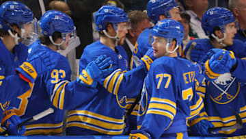 Nov 10, 2023; Buffalo, New York, USA; Buffalo Sabres right wing JJ Peterka (77) celebrates his goal with teammates during the third period against the Minnesota Wild at KeyBank Center. Mandatory Credit: Timothy T. Ludwig-USA TODAY Sports