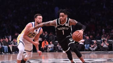 NEW YORK, NY - OCTOBER 28: D'Angelo Russell #1 of the Brooklyn Nets drives to the basket against Stephen Curry #30 of the Golden State Warriors during the game at Barclays Center on October 28, 2018 in the Brooklyn borough of New York City. NOTE TO USER: User expressly acknowledges and agrees that, by downloading and or using this photograph, User is consenting to the terms and conditions of the Getty Images License Agreement. (Photo by Matteo Marchi/Getty Images)