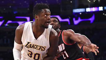 LOS ANGELES, CA - MARCH 26: Noah Vonleh #21 of the Portland Trail Blazers guards Julius Randle #30 of the Los Angeles Lakers in the first half of the game at Staples Center on March 26, 2017 in Los Angeles, California. NOTE TO USER: User expressly acknowledges and agrees that, by downloading and/or using this Photograph, user is consenting to the terms and conditions of the Getty Images License Agreement. (Photo by Jayne Kamin-Oncea/Getty Images)