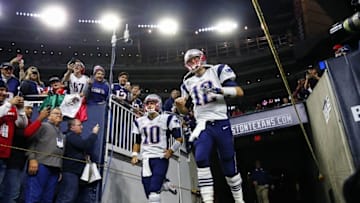 Dec 13, 2015; Houston, TX, USA; New England Patriots quarterback Tom Brady (12) and quarterback Jimmy Garoppolo (10) enter the field before the game against the Houston Texans at NRG Stadium. Mandatory Credit: Kevin Jairaj-USA TODAY Sports