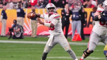 Jan 1, 2016; Glendale, AZ, USA; Ohio State Buckeyes quarterback J.T. Barrett (16) looks to throw during the second half against the Notre Dame Fighting Irish in the 2016 Fiesta Bowl at University of Phoenix Stadium. Mandatory Credit: Matt Kartozian-USA TODAY Sports
