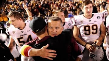 Nov 23, 2013; Pasadena, CA, USA; Arizona State Sun Devils head coach Todd Graham gets a hug after the Sun Devils beat the UCLA Bruins at Rose Bowl. Mandatory Credit: Robert Hanashiro-USA TODAY Sports