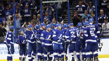 May 26, 2021; Tampa, Florida, USA;Tampa Bay Lightning right wing Barclay Goodrow (19) and teammates celebrate as they beat the Florida Panthers during game six of the first round of the 2021 Stanley Cup Playoffs at Amalie Arena. Mandatory Credit: Kim Klement-USA TODAY Sports