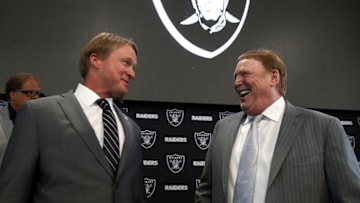 ALAMEDA, CA - JANUARY 09: Oakland Raiders new head coach Jon Gruden (L) talks with Raiders owner Mark Davis during a news conference at Oakland Raiders headquarters on January 9, 2018 in Alameda, California. Jon Gruden has returned to the Oakland Raiders after leaving the team in 2001. (Photo by Justin Sullivan/Getty Images)
