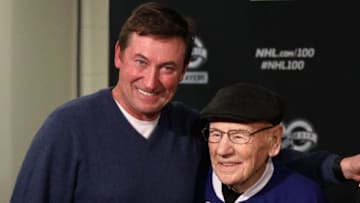 TORONTO, ON - JANUARY 01: NHL Centennial Ambassador Wayne Gretzky poses with Toronto Maple Leafs legend Johnny Bower after a press conference prior to the start of the 2017 Scotiabank NHL Centennial Classic to be played between the Detroit Red Wings and the Toronto Maple Leafs at Exhibition Stadium on January 1, 2017 in Toronto, Ontario, Canada. (Photo by Dave Sandford/NHLI via Getty Images)