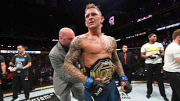 ATLANTA, GA - APRIL 13: (L-R) UFC President Dana White places the interim lightweight championship belt on Dustin Poirier after defeating Max Holloway in their interim lightweight championship bout during the UFC 236 event at State Farm Arena on April 13, 2019 in Atlanta, Georgia. (Photo by Josh Hedges/Zuffa LLC/Zuffa LLC via Getty Images)