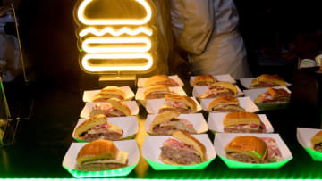 NEW YORK, NEW YORK - OCTOBER 11: A view of Shake Shack burgers on display during the Blue Moon Burger Bash presented by Pat LaFrieda Meats hosted by Rachael Ray at Pier 97 on October 11, 2019 in New York City. (Photo by Noam Galai/Getty Images for NYCWFF)