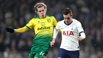 LONDON, ENGLAND - JANUARY 22: Giovani Lo Celso of Tottenham Hotspur and Todd Cantwell of Norwich City battle for the ball during the Premier League match between Tottenham Hotspur and Norwich City at Tottenham Hotspur Stadium on January 22, 2020 in London, United Kingdom. (Photo by Naomi Baker/Getty Images)