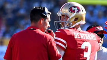 CARSON, CA - SEPTEMBER 30: Head coach Kyle Shanahan talks with quarterback C.J. Beathard #3 of the San Francisco 49ers during the fourth quarter of the game against the Los Angeles Chargers at StubHub Center on September 30, 2018 in Carson, California. (Photo by Jayne Kamin-Oncea/Getty Images)