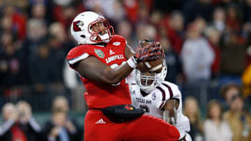 NASHVILLE, TN - DECEMBER 30: Keith Towbridge #89 of the Louisville Cardinals makes a 17-yard touchdown reception against the Texas A&M Aggies in the third quarter of the Franklin American Mortgage Music City Bowl at Nissan Stadium on December 30, 2015 in Nashville, Tennessee. (Photo by Joe Robbins/Getty Images)
