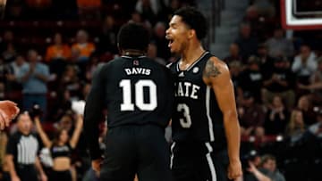 Jan 17, 2023; Starkville, Mississippi, USA; Mississippi State Bulldogs guard Shakeel Moore (3) reacts with Mississippi State Bulldogs guard Dashawn Davis (10) during the first half against the Tennessee Volunteers at Humphrey Coliseum. Mandatory Credit: Petre Thomas-USA TODAY Sports