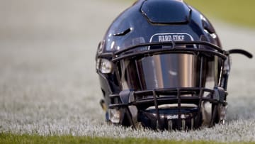 PALO ALTO, CA - OCTOBER 03: A detailed view of an Arizona Wildcats players helmet sitting on the field during pregame warm ups prior to playing the Stanford Cardinal in a NCAA football game at Stanford Stadium on October 3, 2015 in Palo Alto, California. (Photo by Thearon W. Henderson/Getty Images)