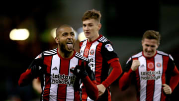 SHEFFIELD, ENGLAND - NOVEMBER 04: Leon Clarke (L) of Sheffield United celebrates scoring his fourth goal during the Sky Bet Championship match between Sheffield United and Hull City at Bramall Lane on November 4, 2017 in Sheffield, England. (Photo by Nigel Roddis/Getty Images)