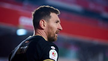 GRANADA, SPAIN - FEBRUARY 03: Lionel Messi of FC Barcelona looks on during the Copa del Rey Match between Granada and FC Barcelona at Estadio Nuevo Los Carmenes on February 03, 2021 in Granada, Spain. Sporting stadiums around Spain remain under strict restrictions due to the Coronavirus Pandemic as Government social distancing laws prohibit fans inside venues resulting in games being played behind closed doors. (Photo by Fran Santiago/Getty Images)