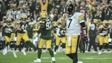 Oct 3, 2021; Green Bay, Wisconsin, USA; Pittsburgh Steelers quarterback Ben Roethlisberger (7) reacts after throwing an interception in the fourth quarter during the game against the Green Bay Packers at Lambeau Field. Mandatory Credit: Benny Sieu-USA TODAY Sports