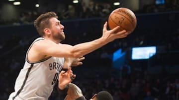 Dec 16, 2015; Brooklyn, NY, USA; Brooklyn Nets center Andrea Bargnani (9) drives the basket as Miami Heat forward Udonis Haslem (40) defends in the second half at Barclays Center. Miami won 104-98. Mandatory Credit: William Hauser-USA TODAY Sports