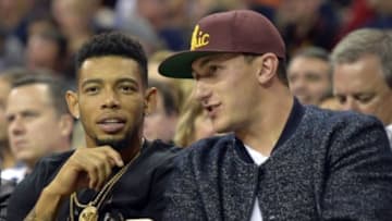 Oct 30, 2014; Cleveland, OH, USA; Cleveland Browns cornerback Joe Haden (left) and quarterback Johnny Manziel talk in the second quarter at Quicken Loans Arena. Mandatory Credit: David Richard-USA TODAY Sports