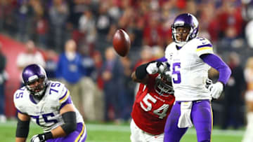 Dec 10, 2015; Glendale, AZ, USA; Arizona Cardinals linebacker Dwight Freeney (54) forces a fumble on Minnesota Vikings quarterback Teddy Bridgewater (5) in the fourth quarter at University of Phoenix Stadium. Mandatory Credit: Mark J. Rebilas-USA TODAY Sports