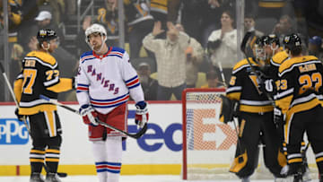 PITTSBURGH, PA - DECEMBER 20: Filip Chytil #72 of the New York Rangers skates off the ice as the Pittsburgh Penguins celebrate a 3-2 win over the Rangers at PPG PAINTS Arena on December 20, 2022 in Pittsburgh, Pennsylvania. (Photo by Justin Berl/Getty Images)