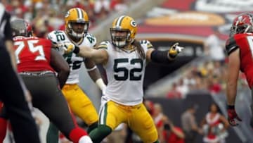 Dec 21, 2014; Tampa, FL, USA; Green Bay Packers outside linebacker Clay Matthews (52) calls a play as he rushes during the first half against the Tampa Bay Buccaneers at Raymond James Stadium. Mandatory Credit: Kim Klement-USA TODAY Sports