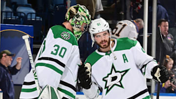 BUFFALO, NY - MARCH 12: Ben Bishop #30 of the Dallas Stars celebrates a shutout victory over the Buffalo Sabres with Tyler Seguin #91 following an NHL game on March 12, 2019 at KeyBank Center in Buffalo, New York. Dallas won, 2-0. (Photo by Joe Hrycych/NHLI via Getty Images)