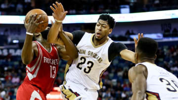 Jan 25, 2016; New Orleans, LA, USA; New Orleans Pelicans forward Anthony Davis (23) defends against Houston Rockets guard James Harden (13) during the second quarter of a game at the Smoothie King Center. Mandatory Credit: Derick E. Hingle-USA TODAY Sports