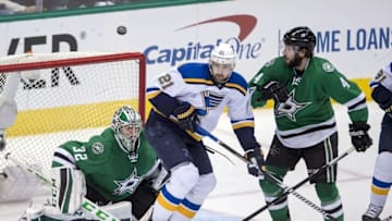 Apr 29, 2016; Dallas, TX, USA; St. Louis Blues center Patrik Berglund (21) looks for the puck as Dallas Stars goalie Kari Lehtonen (32) and defenseman Jason Demers (4) defend during the third period in game one of the second round of the 2016 Stanley Cup Playoffs at the American Airlines Center. The Stars defeat the Blue 2-1. Mandatory Credit: Jerome Miron-USA TODAY Sports
