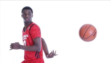 March 30, 2013; Chicago, IL, USA; McDonald's All American forward Andrew Wiggins (22) poses for photos on Media Day for the 36th McDonalds All American Games to be held at the United Center. (Mandatory Credit: Brian Spurlock-USA TODAY Sports)