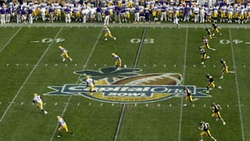 ORLANDO, FL - JANUARY 1: The Iowa Hawkeyes kick off after scoring a touchdown against the LSU Tigers during the Capital One Bowl at the Florida Citrus Bowl on January 1, 2005 in Orlando, Florida. (Photo by Matt Stroshane/Getty Images)