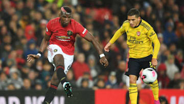 MANCHESTER, ENGLAND - SEPTEMBER 30: Paul Pogba of Manchester United battles for possession with Lucas Torreira of Arsenal during the Premier League match between Manchester United and Arsenal FC at Old Trafford on September 30, 2019 in Manchester, United Kingdom. (Photo by Michael Regan/Getty Images)