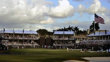 March 10, 2013; Miami, FL, USA; Phil Mickelson and Steve Stricker arrive on the 18th hole of the WGC Cadillac Championship at Trump Doral Golf Club. Mandatory Credit: Brad Barr-USA TODAY Sports