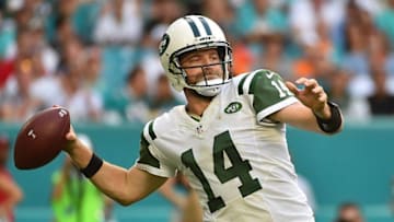 Nov 6, 2016; Miami Gardens, FL, USA; New York Jets quarterback Ryan Fitzpatrick (14) attempts a pass against the Miami Dolphins during the second half at Hard Rock Stadium. The Miami Dolphins defeat the New York Jets 27-23. Mandatory Credit: Jasen Vinlove-USA TODAY Sports
