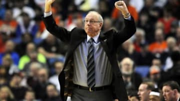 Mar 20, 2014; Buffalo, NY, USA; Syracuse Orange head coach Jim Boeheim works from the sideline in the first half of a men