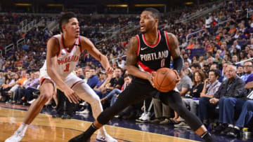 PHOENIX, AZ - OCTOBER 18: Damian Lillard #0 of the Portland Trail Blazers handles the ball against the Phoenix Suns on October 18, 2017 at Talking Stick Resort Arena in Phoenix, Arizona. NOTE TO USER: User expressly acknowledges and agrees that, by downloading and or using this photograph, user is consenting to the terms and conditions of the Getty Images License Agreement. Mandatory Copyright Notice: Copyright 2017 NBAE (Photo by Barry Gossage/NBAE via Getty Images)