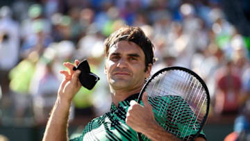 INDIAN WELLS, CA - MARCH 19: Roger Federer of Switzerland throws his wristband to fans in the stands as celebrates after defeating Stanislas Wawrinka of Switzerland in the mens final during day fourteen of the BNP Paribas Open at Indian Wells Tennis Garden on March 19, 2017 in Indian Wells, California. (Photo by Kevork Djansezian/Getty Images)
