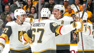 NASHVILLE, TN - NOVEMBER 27: The Vegas Golden Knights celebrate a goal against the Nashville Predators at Bridgestone Arena on November 27, 2019 in Nashville, Tennessee. (Photo by John Russell/NHLI via Getty Images)