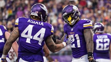 Jan 1, 2017; Minneapolis, MN, USA; Minnesota Vikings running back Jerick McKinnon (21) celebrates his touchdown with running back Matt Asiata (44) during the fourth quarter at U.S. Bank Stadium. Mandatory Credit: Brace Hemmelgarn-USA TODAY Sports