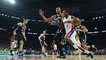 Nov 1, 2014; Auburn Hills, MI, USA; Brooklyn Nets center Jerome Jordan (9) guards Detroit Pistons guard Brandon Jennings (7) during the third quarter at The Palace of Auburn Hills. Mandatory Credit: Tim Fuller-USA TODAY Sports