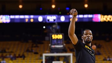 OAKLAND, CA - APRIL 30: Kevin Durant #35 of the Golden State Warriors warms up before Game Two of the Western Conference Semifinals of the 2019 NBA Playoffs against the Houston Rockets on April 30, 2019 at ORACLE Arena in Oakland, California. NOTE TO USER: User expressly acknowledges and agrees that, by downloading and or using this photograph, user is consenting to the terms and conditions of Getty Images License Agreement. Mandatory Copyright Notice: Copyright 2019 NBAE (Photo by Noah Graham/NBAE via Getty Images)
