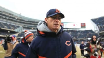 Dec 21, 2014; Chicago, IL, USA; Chicago Bears head coach Marc Trestman runs off the field after being defeated by the Detroit Lions 20-14 at Soldier Field. Mandatory Credit: Andrew Weber-USA TODAY Sports