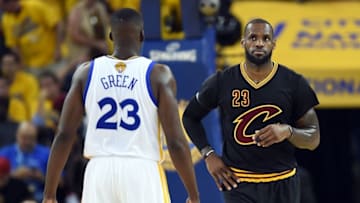 Jun 19, 2016; Oakland, CA, USA; Cleveland Cavaliers forward LeBron James (23) and Golden State Warriors forward Draymond Green (23) during the first quarter in game seven of the NBA Finals at Oracle Arena. Mandatory Credit: Bob Donnan-USA TODAY Sports