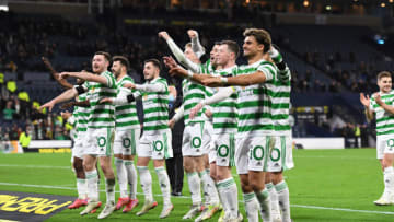 Celtic players celebrate after winning their Scottish Leagues Cup semifinal match. (Photo by Mark Runnacles/Getty Images)
