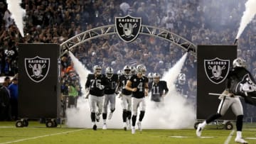 Nov 6, 2016; Oakland, CA, USA; Oakland Raiders quarterback Derek Carr (4) jogs onto the field before the start of the game against the Denver Broncos at Oakland Coliseum. The Raiders defeated the Broncos 30-20. Mandatory Credit: Cary Edmondson-USA TODAY Sports