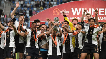 Germany players celebrate after winning the European Under-17 Championship. (Photo by Attila KISBENEDEK / AFP) (Photo by ATTILA KISBENEDEK/AFP via Getty Images)