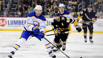 PITTSBURGH, PENNSYLVANIA - DECEMBER 17: Mark Jankowski #17 of the Buffalo Sabres controls the puck against the Pittsburgh Penguins during the second period of a game at PPG PAINTS Arena on December 17, 2021 in Pittsburgh, Pennsylvania. (Photo by Emilee Chinn/Getty Images)