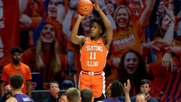 Feb 16, 2021; Champaign, Illinois, USA; Illinois Fighting Illini guard Ayo Dosunmu (11) shoots against the Northwestern Wildcats during the second half at the State Farm Center. Mandatory Credit: Patrick Gorski-USA TODAY Sports