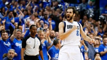 May 2, 2014; Dallas, TX, USA; Dallas Mavericks guard Jose Calderon (8) reacts after hitting a three point shot during the game against the San Antonio Spurs in game six of the first round of the 2014 NBA Playoffs at American Airlines Center. Mandatory Credit: Kevin Jairaj-USA TODAY Sports