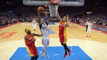 May 10, 2015; Los Angeles, CA, USA; Los Angeles Clippers forward Matt Barnes (22) is defended by Houston Rockets forward Josh Smith (5) and guard Nick Johnson (3) in game three of the second round of the NBA Playoffs at Staples Center. The Clippers defeated the Rockets 128-95 to take a 3-1 lead. Mandatory Credit: Kirby Lee-USA TODAY Sports